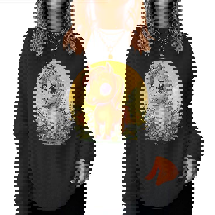 花畑に大きな目を持つかわいいポニー レディーススウェットシャツ