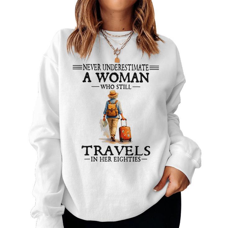 Never Underestimate A Woman Who Still Travels In Her 80'S Women Sweatshirt