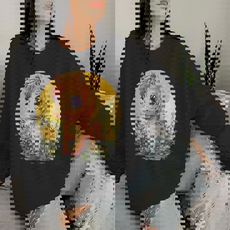 花畑に大きな目を持つかわいいポニー レディーススウェットシャツ 彼女への贈り物