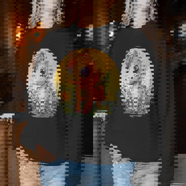 花畑に大きな目を持つかわいいポニー レディーススウェットシャツ 面白い贈り物