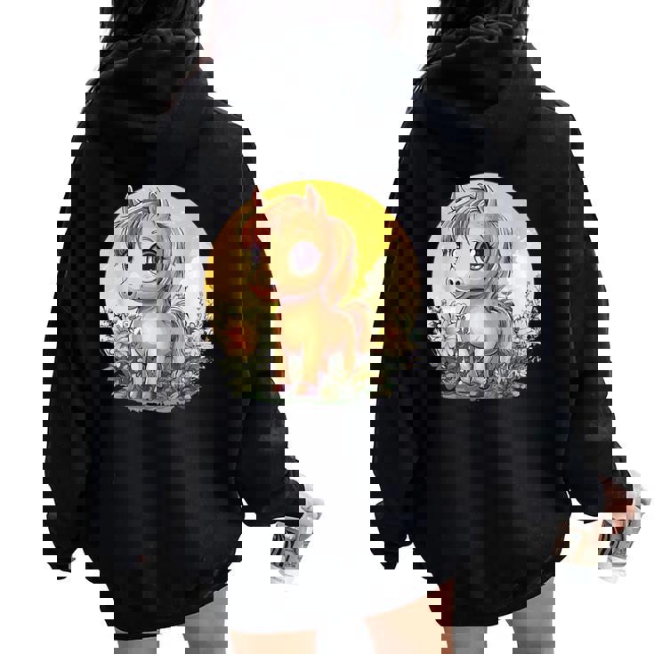 花畑に大きな目を持つかわいいポニー レディース オーバーサイズ パーカー バックプリント