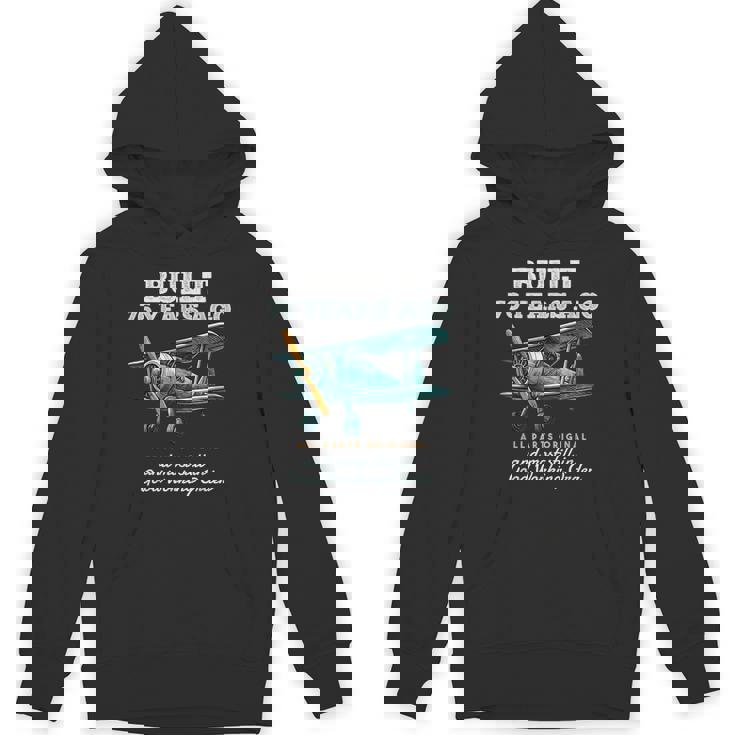 76年前に建てられた古いヴィンテージ飛行機76歳の誕生日男性。 パーカー