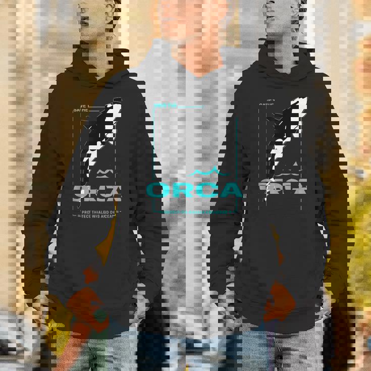 クジラと海を守るシャチ レトロなシャチのデザイン パーカー