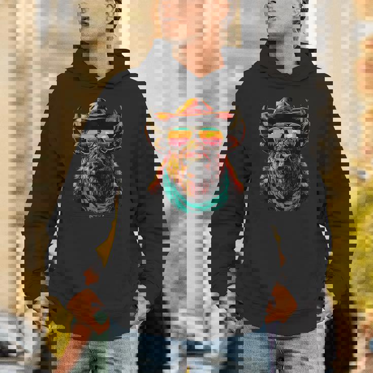 サングラス カラフル バイソン カウボーイ 動物 夕日 ウエスタン パーカー