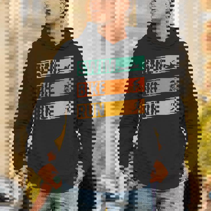 スイム・バイク・ラン トライアスロン選手 アスリート スポーツ トライアスロン パーカー