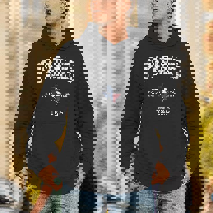 パリテキサスtx ビンテージ州旗スポーツデザイン パーカー