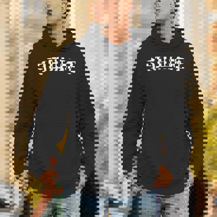 崇高な パーカー