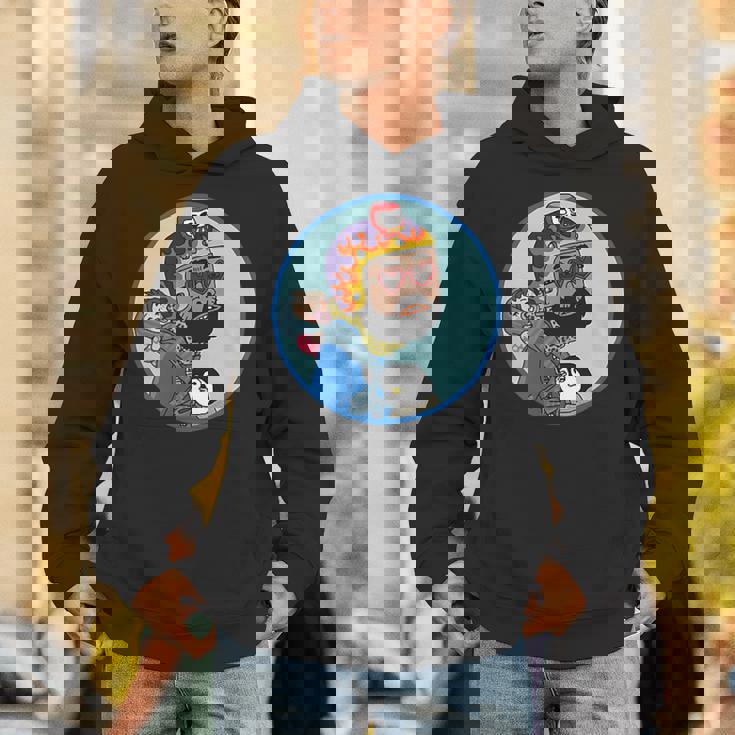 赤ちゃんをおんぶしたファンキー男 ハート型のサングラス ミニダルマ ヒゲ ファイヤーパターンのヘルメット パーカー