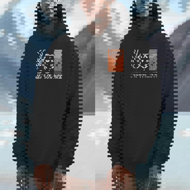 ピース、ラブカリンバレトロカリンバラバー パーカー