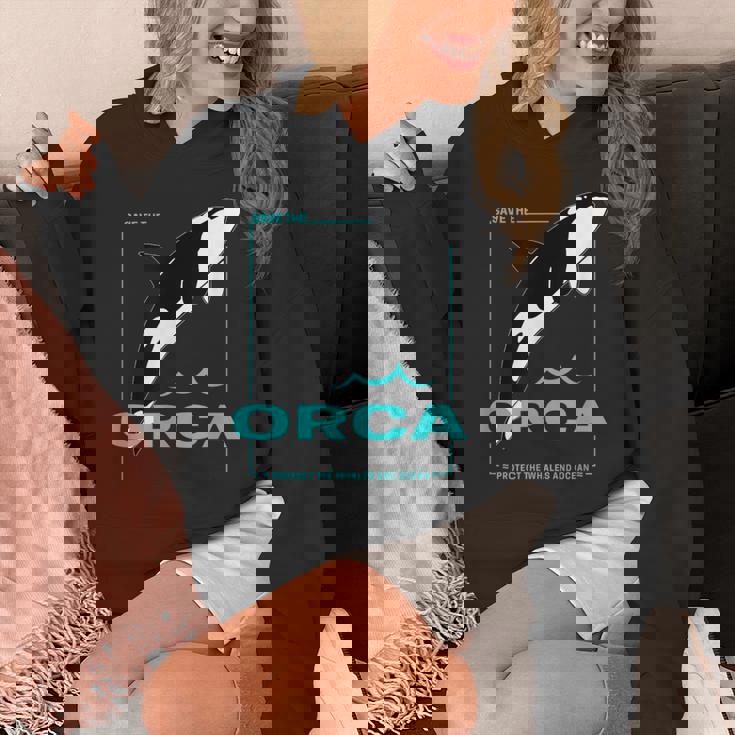 クジラと海を守るシャチ レトロなシャチのデザイン パーカー