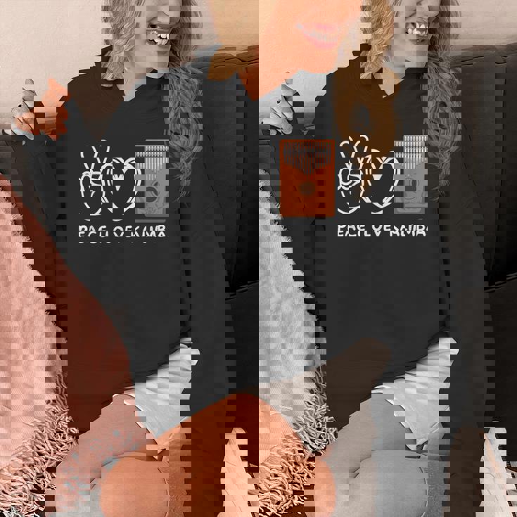 ピース、ラブカリンバレトロカリンバラバー パーカー