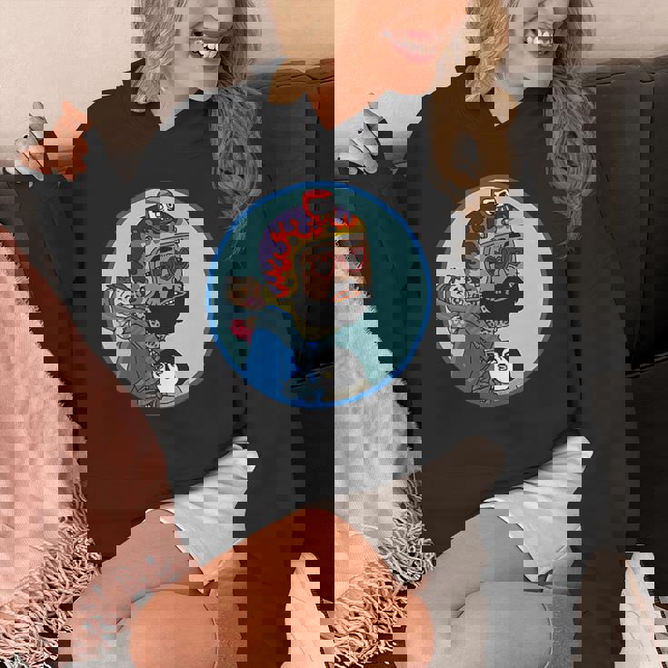 赤ちゃんをおんぶしたファンキー男 ハート型のサングラス ミニダルマ ヒゲ ファイヤーパターンのヘルメット パーカー