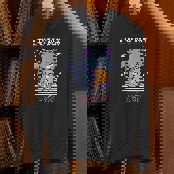 たい焼きが大好き かわいい かわいい 猫がたい焼きを食べる 日本アニメ パーカー