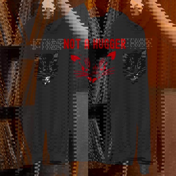 ハガーじゃない、かわいいシューという音がする黒猫 地獄の子猫 キティ パーカー