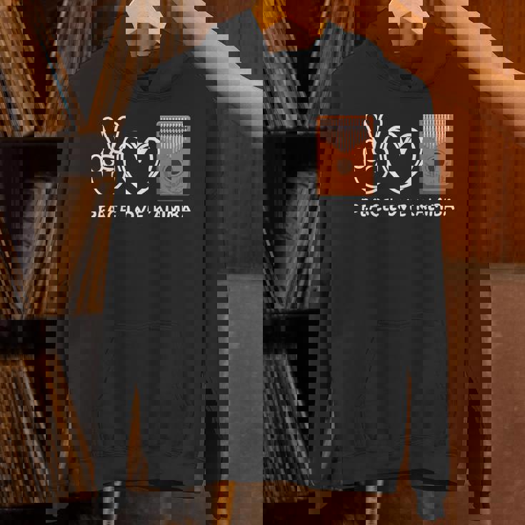 ピース、ラブカリンバレトロカリンバラバー パーカー