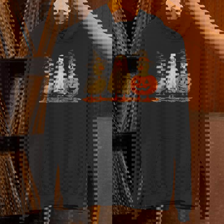 ペンギン 魔女 ゴースト パンプキン トリオ ハロウィン 楽しい 長袖tシャツ パーカー