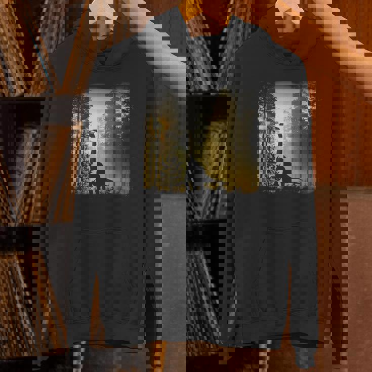 夜明けの竜脚類恐竜の森 リアルなグラフィックデザイン パーカー