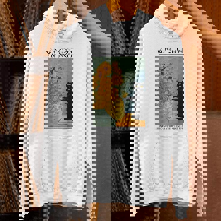 ひまわりと黒猫のヴィンテージアート 猫好き 猫飼い 猫 ネコ ねこくろねこ好き 面白い パーカー