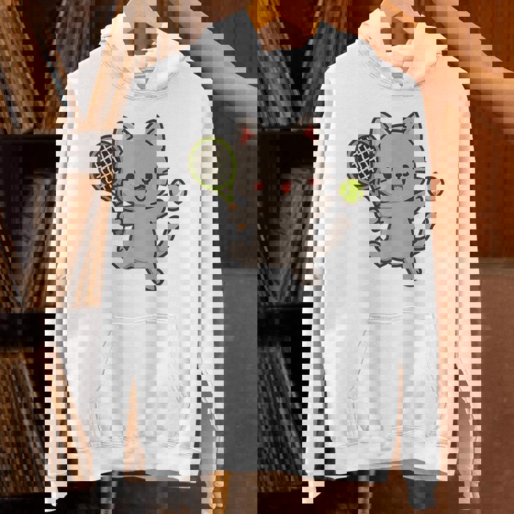 テニスをする猫。かわいいスポーツ猫。 パーカー