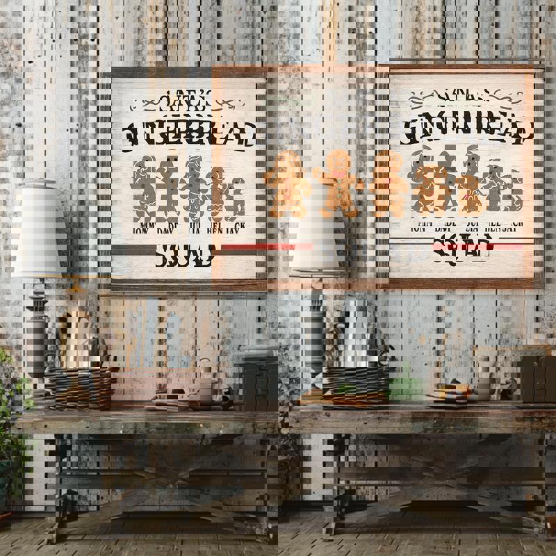 Gingerbread family canvas with personalized names, snowflake details on wood grain, farmhouse Christmas hallway decor