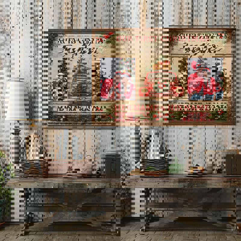 First Christmas together canvas wall art, personalized names over evergreen wreath on gray shiplap, landscape orientation