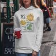 82 Years Loved And Blessed 花柄 フラワースタンプ 82歳の誕生日 レディースパーカー 面白い贈り物