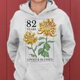 82 Years Loved And Blessed 花柄 フラワースタンプ 82歳の誕生日 レディースパーカー