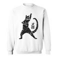 太極拳の練習をしている陽気な猫 陰陽 長袖tシャツ スウェットシャツ