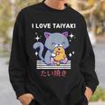 たい焼きが大好き かわいい かわいい 猫がたい焼きを食べる 日本アニメ スウェットシャツ 彼への贈り物