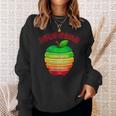 「Powered By Apples（リンゴの力）」リンゴ スライス 充電 バッテリー 残量 おもしろみ 可愛い スウェットシャツ 彼女への贈り物