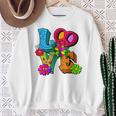 明るくカラフルな愛と平和 ピースサイン フラワートップ スウェットシャツ 年配の女性への贈り物