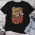 ミツバチ 養蜂家 ミツバチの巣立ち Bee Nice Or Buzz Off レディースTシャツ 面白い贈り物