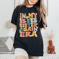 In My Big Sister Again Era Groovy Big Sister Announcement Women's Oversized Comfort T-Shirt Black In My Big Sister Again Era Groovy Big Sister Announcement Women's Oversized Comfort T-Shirt Black