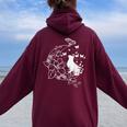 花柄の三日月と蝶を持った猫。 レディース オーバーサイズ パーカー バックプリント Maroon
