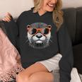 サングラスをかけたクールなカワウソのグラフィックアート 長袖tシャツ パーカー