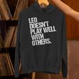 レオは他の人とうまく遊ばない 面白い皮肉 長袖tシャツ パーカー